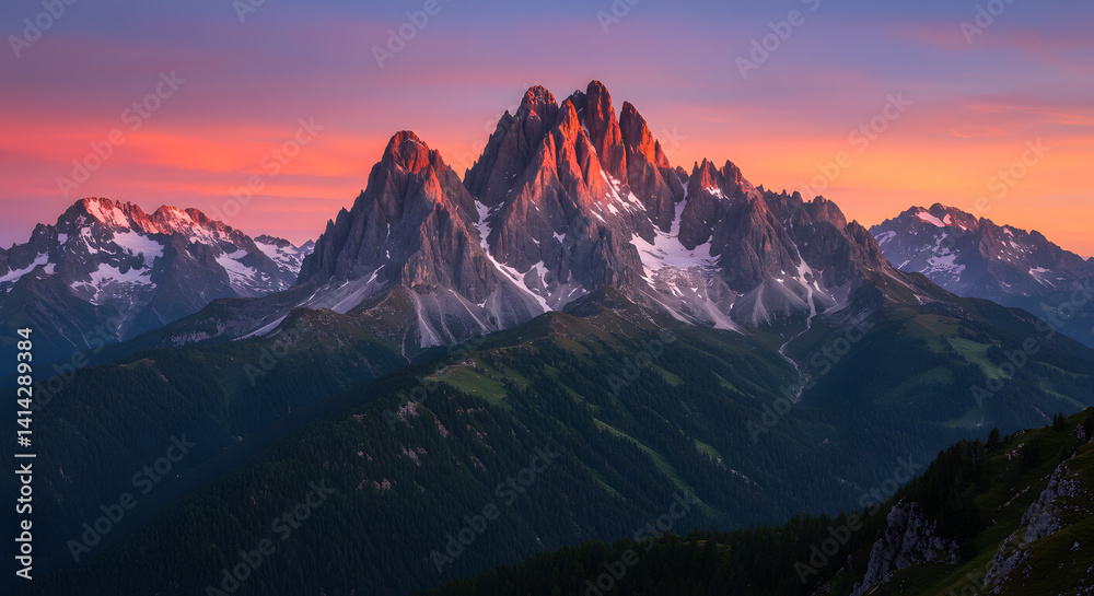 Obraz premium Majestic Mountain Peaks at Sunset with Colorful Sky and Dramatic Light