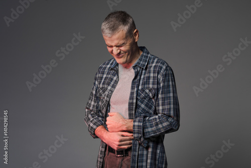 Man suffering from abdominal pain