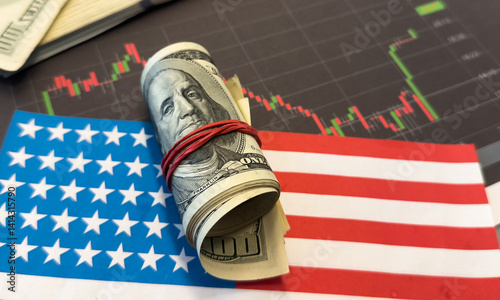 Crisis in USA, rising inflation, devaluation of dollars and the economy. Stock market trading graph with american flag is damage.Effect of recession US economy