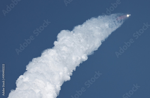 Fototapeta Naklejka Na Ścianę i Meble -  Spacecraft Launches on Super Heavy Booster into the Sky