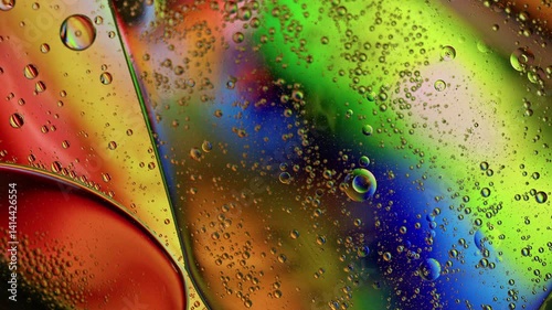Colorful Oil Bubbles Moving on a Water Surface