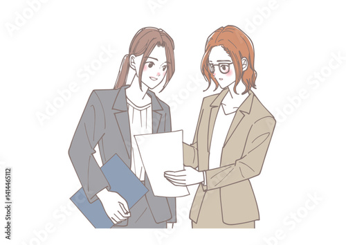 資料を見て話し合う若い女性のチーム