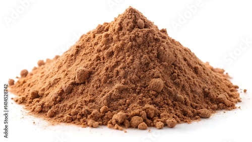 a small pile of brown powder on a white background