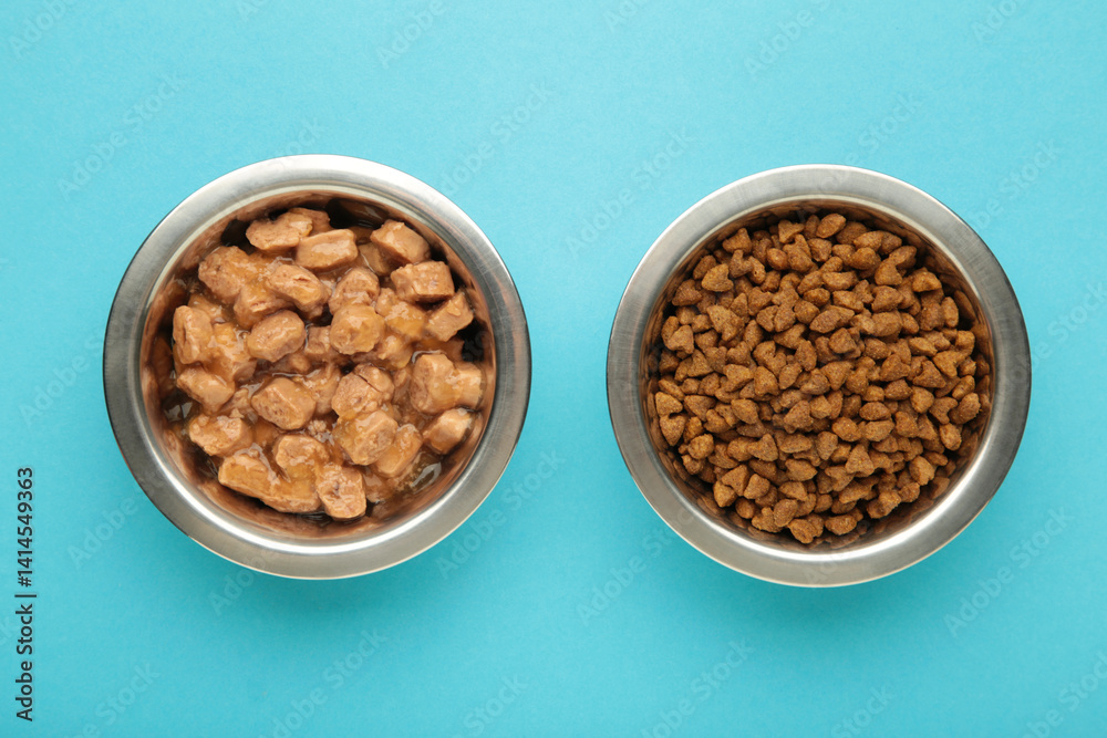 Ταπετσαρία Wet and dry food for dogs and cats in silver bowl on blue background
