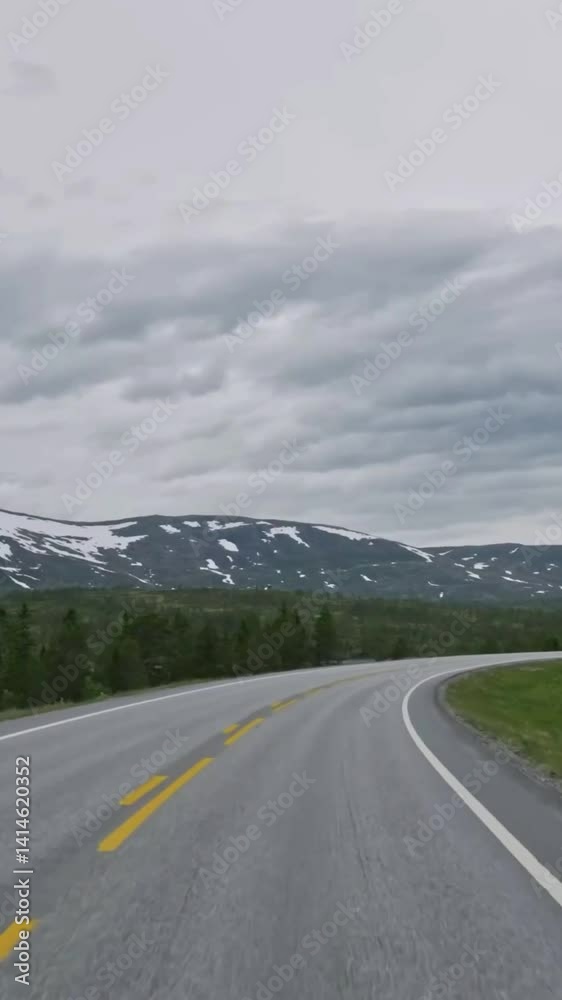 Vertical view of Norway road from car Vertical view of Norway road from car