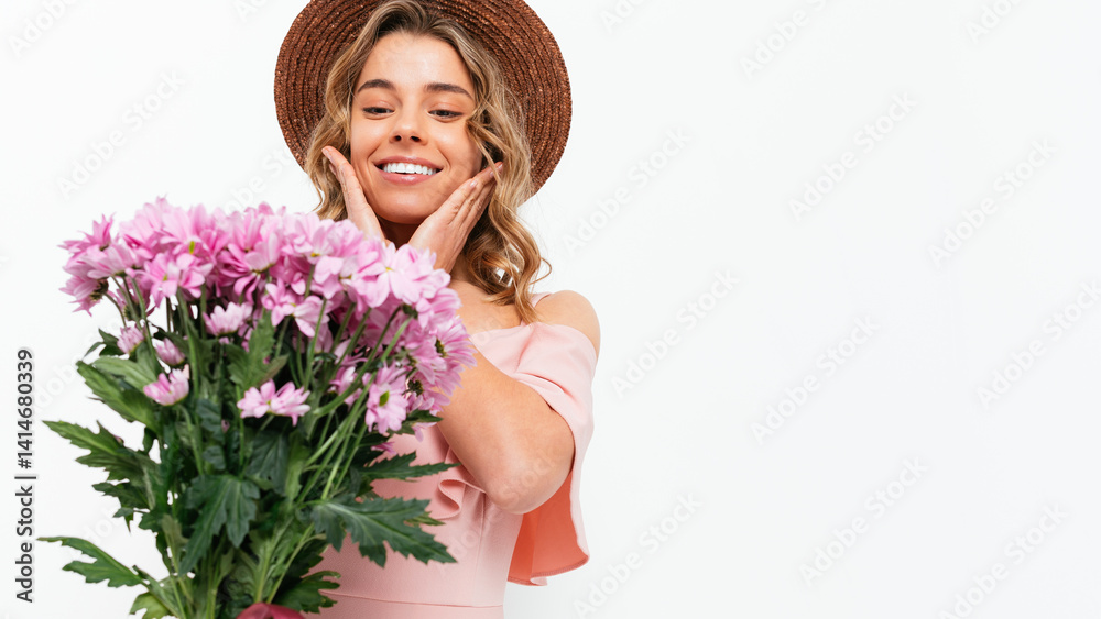 A woman wearing a pink dress