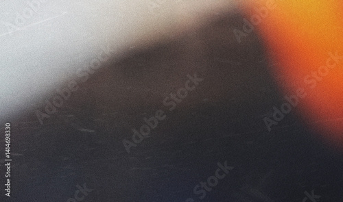 grainy colorful warm orange light leaks on black background with dust texture. abstract damaged scratched retro film analog effect for using over photos as overlay or screen filter