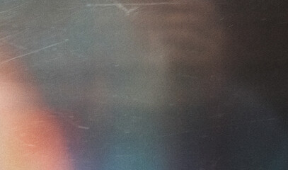 grainy colorful warm orange light leaks on black background with dust texture. abstract damaged scratched retro film analog effect for using over photos as overlay or screen filter