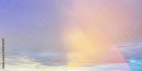 Dramatic and panoramic aerial view of colorful gradient twilight sky and amazing beautiful rainbow for meteorology presentation and landscape background.