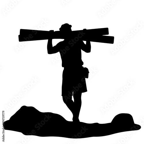 Man lifting wooden beams in silhouette, strength and determination