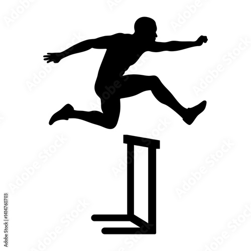 Silhouette of a male athlete jumping a hurdle during a 100 meter hurdles race