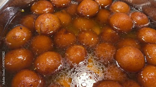 Close up shot of delicious Gulab Jamun, an Indian sweet dish.