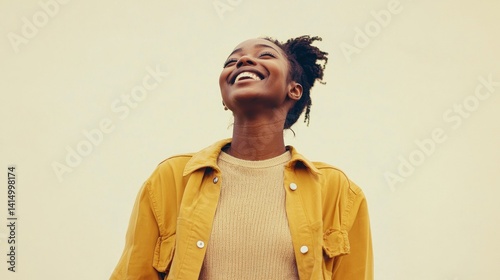 Person in an elated state, with a neutral background perfect for overlay text.