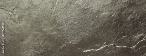 Metallic bronze background with a rough texture. The background features a bronze color with a rugged, uneven surface. Textured stone background vector. Gold background.