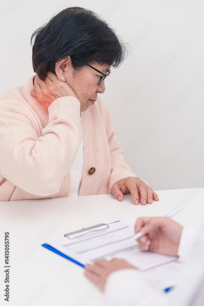 Elderly Woman having Shoulder and Neck and consulting doctor in hospital. Muscle painful due to Myofascial pain syndrome and Fibromyalgia, rheumatism, Scapular pain, Cervical Spine. ergonomic concept Elderly Woman having Shoulder and Neck and consulting doctor in hospital. Muscle painful due to Myofascial pain syndrome and Fibromyalgia, rheumatism, Scapular pain, Cervical Spine. ergonomic concept