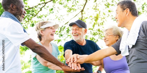 Obraz na płótnie Diverse seniors enjoying outdoor exercise. Diverse senior people exercising for well being. health and wellness concept, Wellness routine. outdoor exercise for senior. w salonie