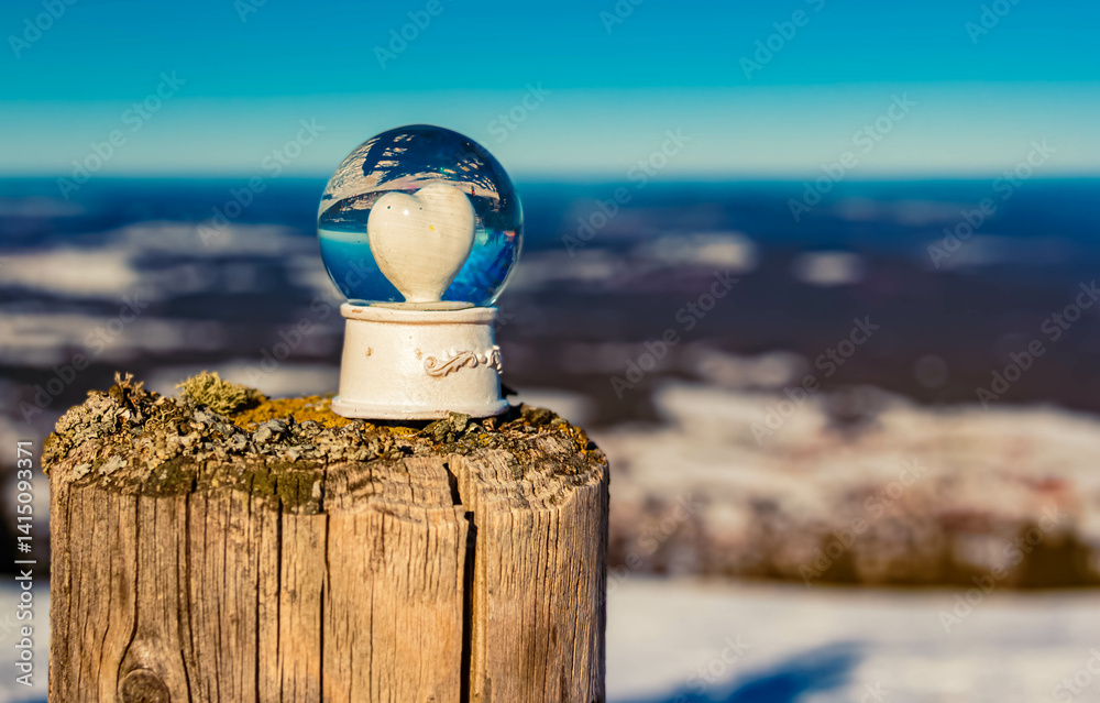 Crystal ball, with a heart inside, alpine winter landscape shot at Bad Kohlgrub, Garmisch-Partenkirchen, Bavaria, Germany