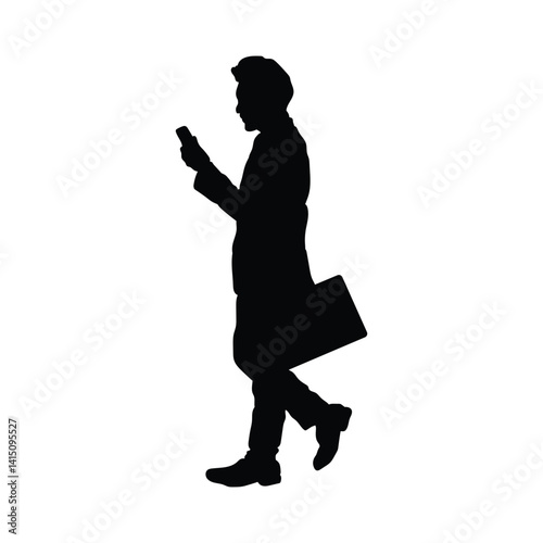 Silhouette of a man walking with a phone.