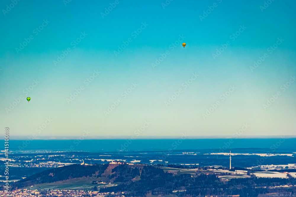 Alpine winter view with many hot air balloons at Bad Kohlgrub, Garmisch-Partenkirchen, Bavaria, Germany