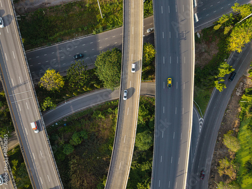 Obraz na płótnie Aerial view city transport junction cross road with vehicle movement w salonie
