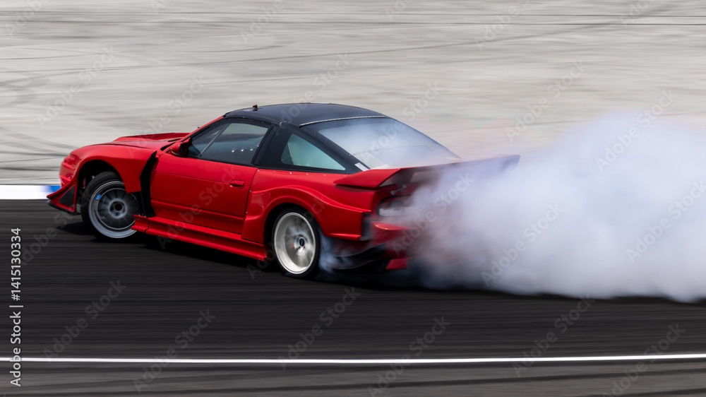 Car drifting on asphalt race track with lots of smoke from burning tires, Professional driver drift car on asphalt race track, Car motion blurred, Motorsport car drift.