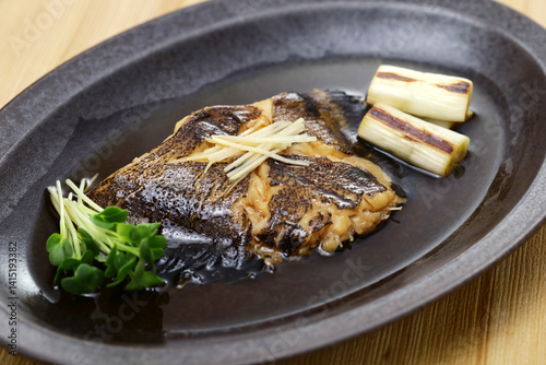 Boiled flatfish in a broth of sweetened soy sauce-based dashi, Japanese cuisine
 photo