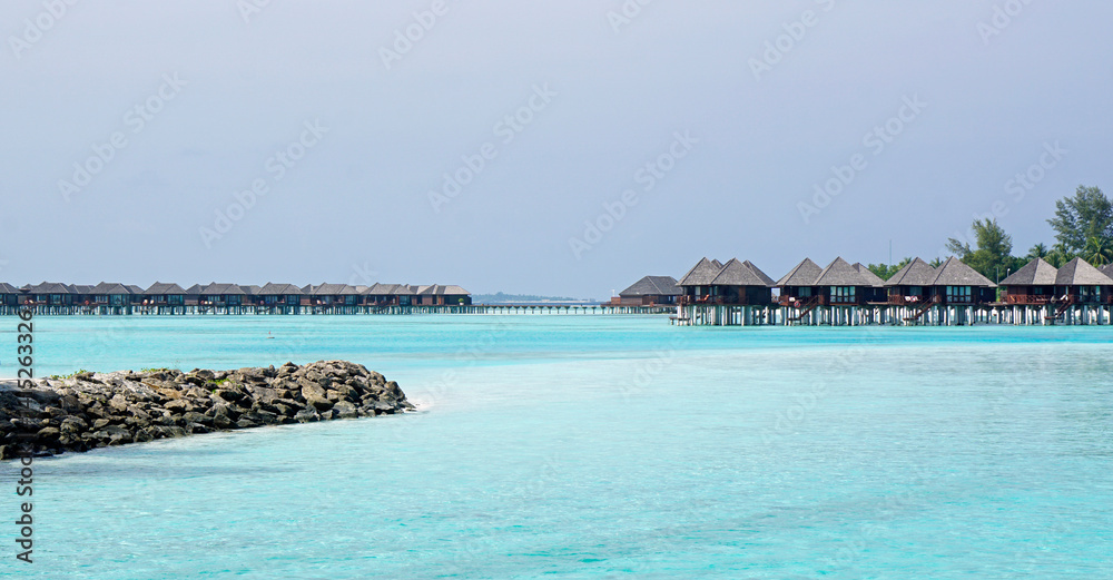 Fototapeta premium water villas on a exotic maldives island