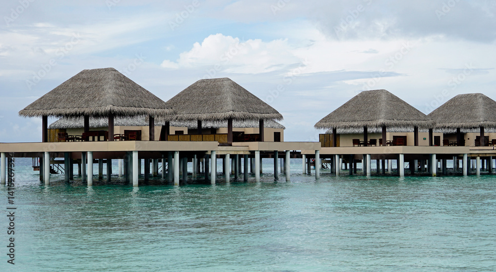 water villas on a exotic maldives island water villas on a exotic maldives island