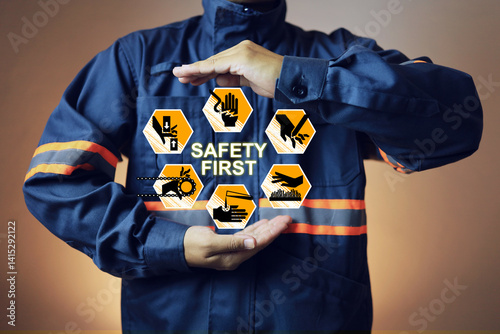 Safety first workplace hazard prevention concept with supervisor and warning icons of potential hazards from carelessness