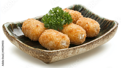 Obraz na płótnie Golden croquettes on ceramic plate w salonie
