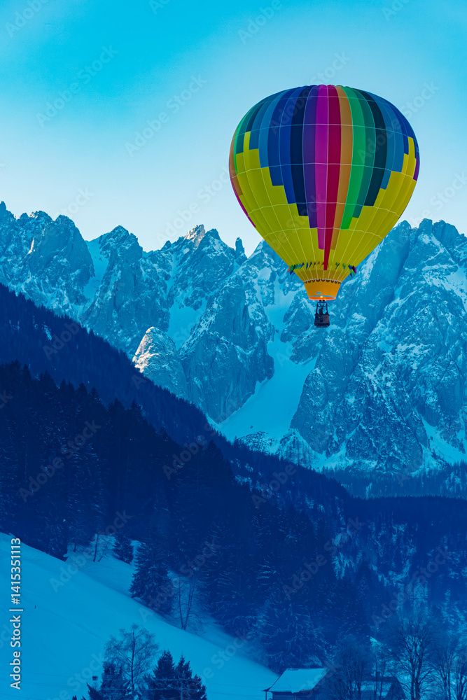 Alpine winter view with hot air balloons at Gosau, Abtenau, Salzkammergut, Salzburg, Austria