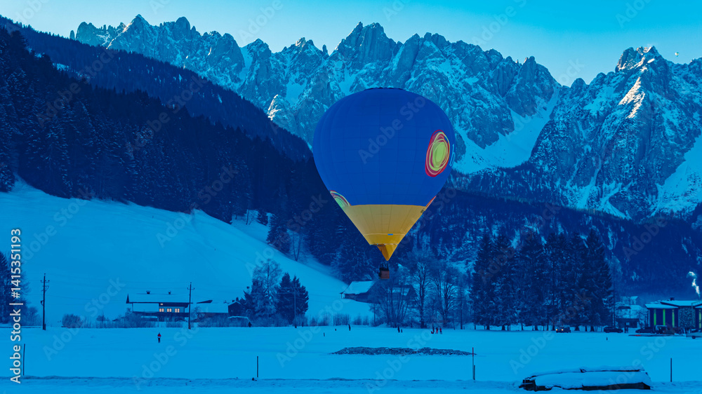 Alpine winter view with hot air balloons at Gosau, Abtenau, Salzkammergut, Salzburg, Austria