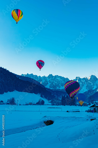 Obraz na płótnie Alpine winter view with hot air balloons at Gosau, Abtenau, Salzkammergut, Salzburg, Austria w salonie
