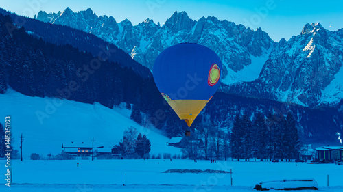 Alpine winter view with hot air balloons at Gosau, Abtenau, Salzkammergut, Salzburg, Austria