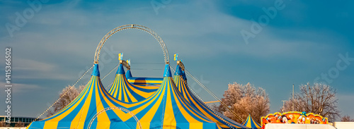 Obraz na płótnie Yellow blue circus tents on a sunny winter day at Straubing, Straubing-Bogen, Bavaria, Germany w salonie