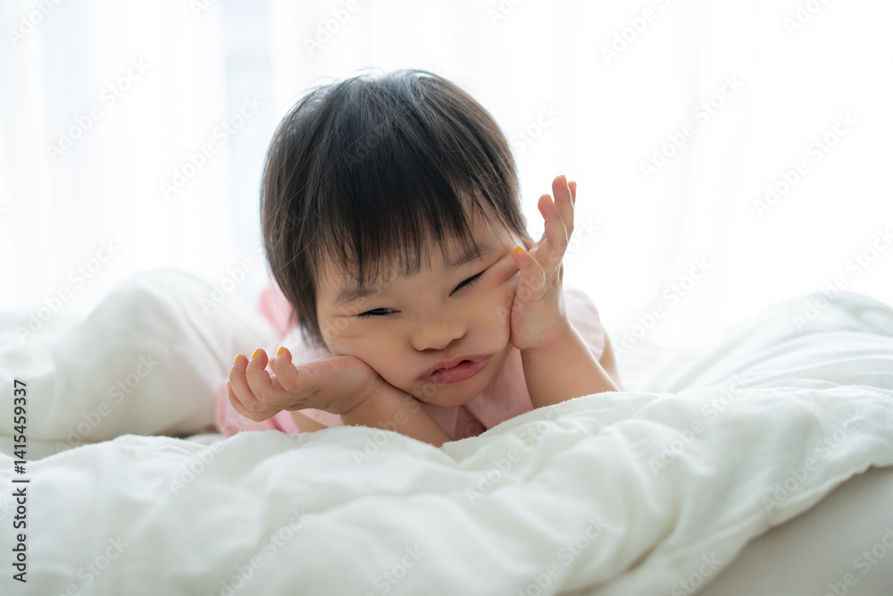 the baby is playing in bedroom the baby is playing in bedroom