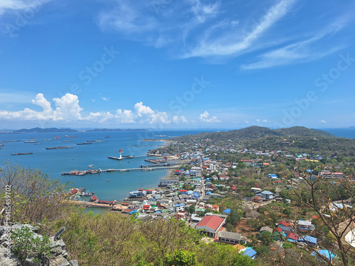The hills of Koh Sichang are full of colorful houses, overlooking the community and the port. View from Chulachomklao mountain Peak. The top sights in Ko Sichang Island, Chonburi, Thailand.