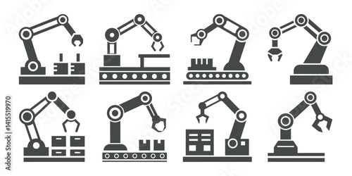 Industrial robotic arms work on factory assembly lines moving boxes and parts in automated production processes