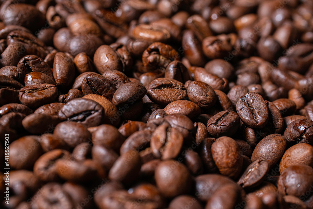 A detailed view of coffee beans being ground, showing off their chocolate texture that conveys the theme of coffee, energy and morning rituals. A detailed view of coffee beans being ground, showing off their chocolate texture that conveys the theme of coffee, energy and morning rituals.