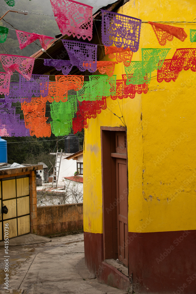 Beautiful Day of the Dead decorations hang in the historic downtown heart of Pinal de Amoles, Querétaro, Mexico.