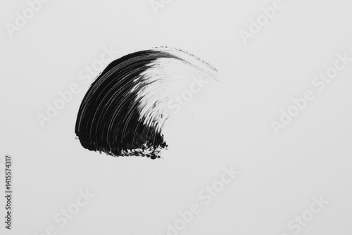 swatch of black ink on a white background