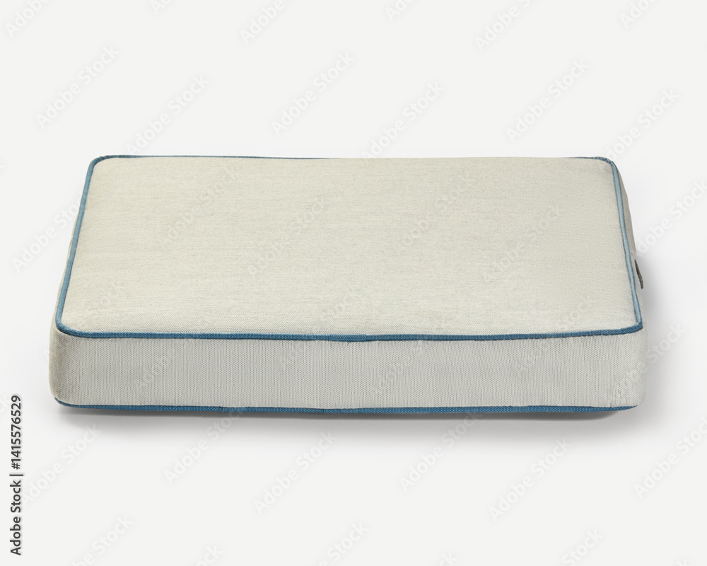 Comfortable pet bed resting on white background