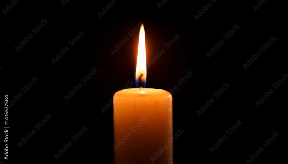 One candle burning slowly isolated on pitch black background One candle burning slowly isolated on pitch black background