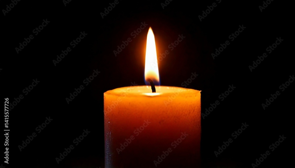 One candle burning slowly isolated on pitch black background