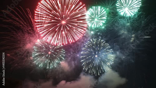 Fireworks celebration 4k video clip.Amazing fireworks footage 4k resolution,background golden shining fireworks with bokeh lights in the night sky. glowing fireworks show. New year's eve fireworks
