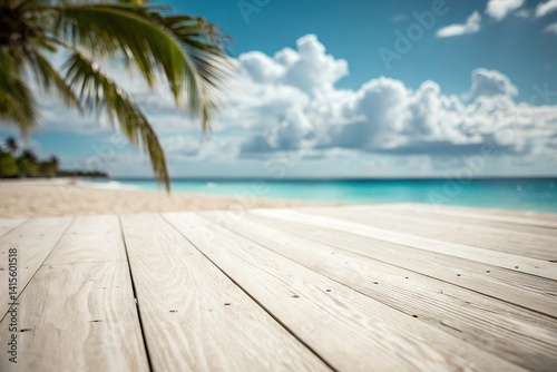 A tranquil beach scene invites relaxation under a bright sunny sky  offering a serene escape with light wooden planks in the foreground.