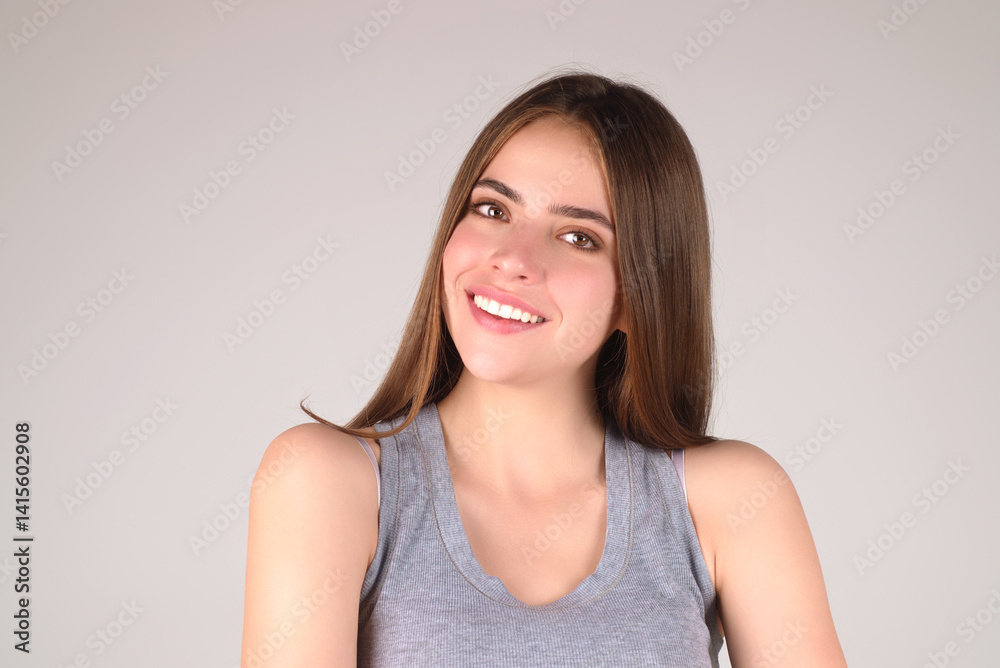 Smiling face. Female face happy portrait. Close up portrait of young happy smiling girl. Young woman smiling with teeth, looking in camera with happy face expression. Smiling female portrait. Smiling face. Female face happy portrait. Close up portrait of young happy smiling girl. Young woman smiling with teeth, looking in camera with happy face expression. Smiling female portrait.
