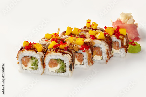Obraz na płótnie Delicious sushi rolls with mango, salmon, and red tobiko on white background w salonie