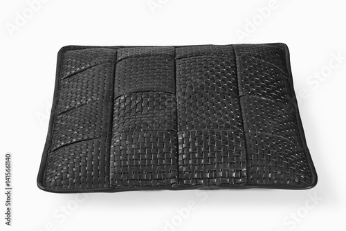 Obraz na płótnie Black leather cushion resting on white background w salonie