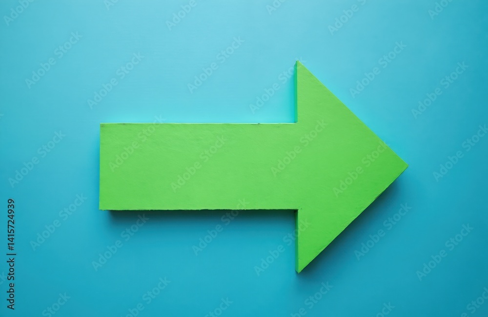 Green paper arrow points right against a blue backdrop. Symbol of direction choice or navigation. Design element for website, presentation or infographic. Message concept. Green paper arrow points right against a blue backdrop. Symbol of direction choice or navigation. Design element for website, presentation or infographic. Message concept.